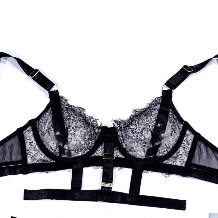 Label Lust Embrace enchantment with the Enchantress Clear/Dusky Bondage Bra & Panty-Garter Set - Crotchless Lace Lingerie. This luxurious ensemble, featuring intricate lace and a daring design, is perfect for those who crave a fusion of designer elegance and alluring bondage elements. Elevate your intimate moments with this captivating lingerie set.